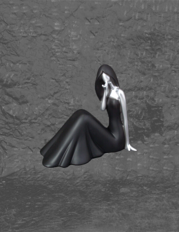 Black Figurine Of Seated Woman
